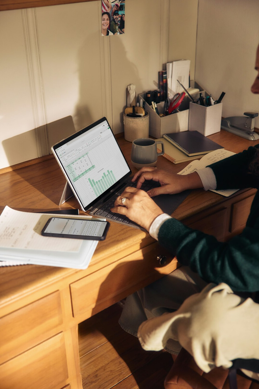 person calculating budget at home