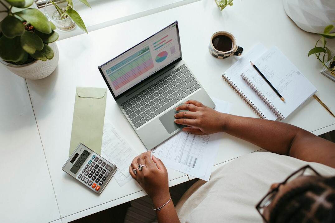 person calculating finances