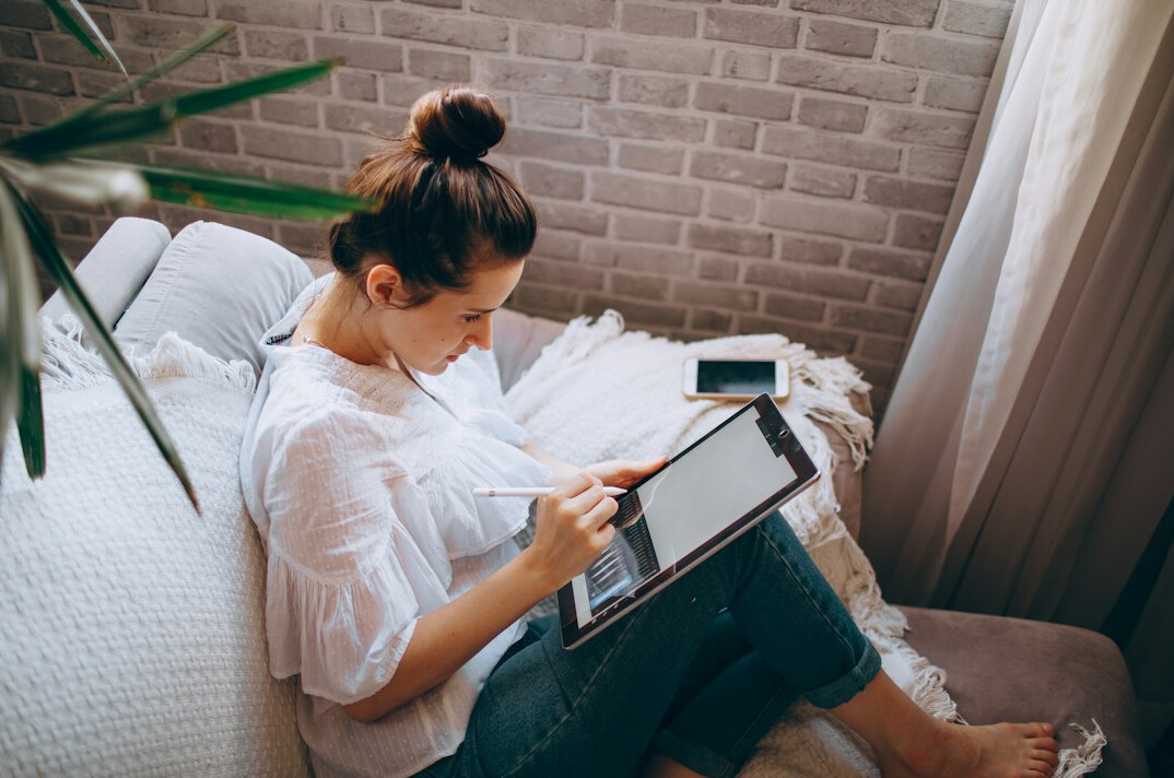 woman reviewing monthly budget